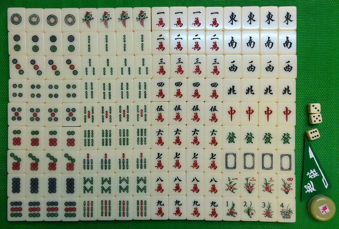 Classic Canton-style full mahjong set — suits, honors and flower tiles arranged as one complete set