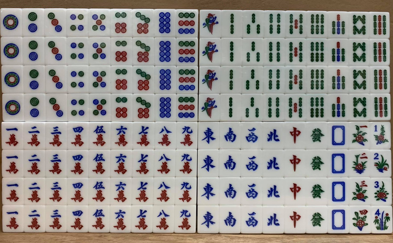 Another classic full-set layout — complete tile inventory on the table