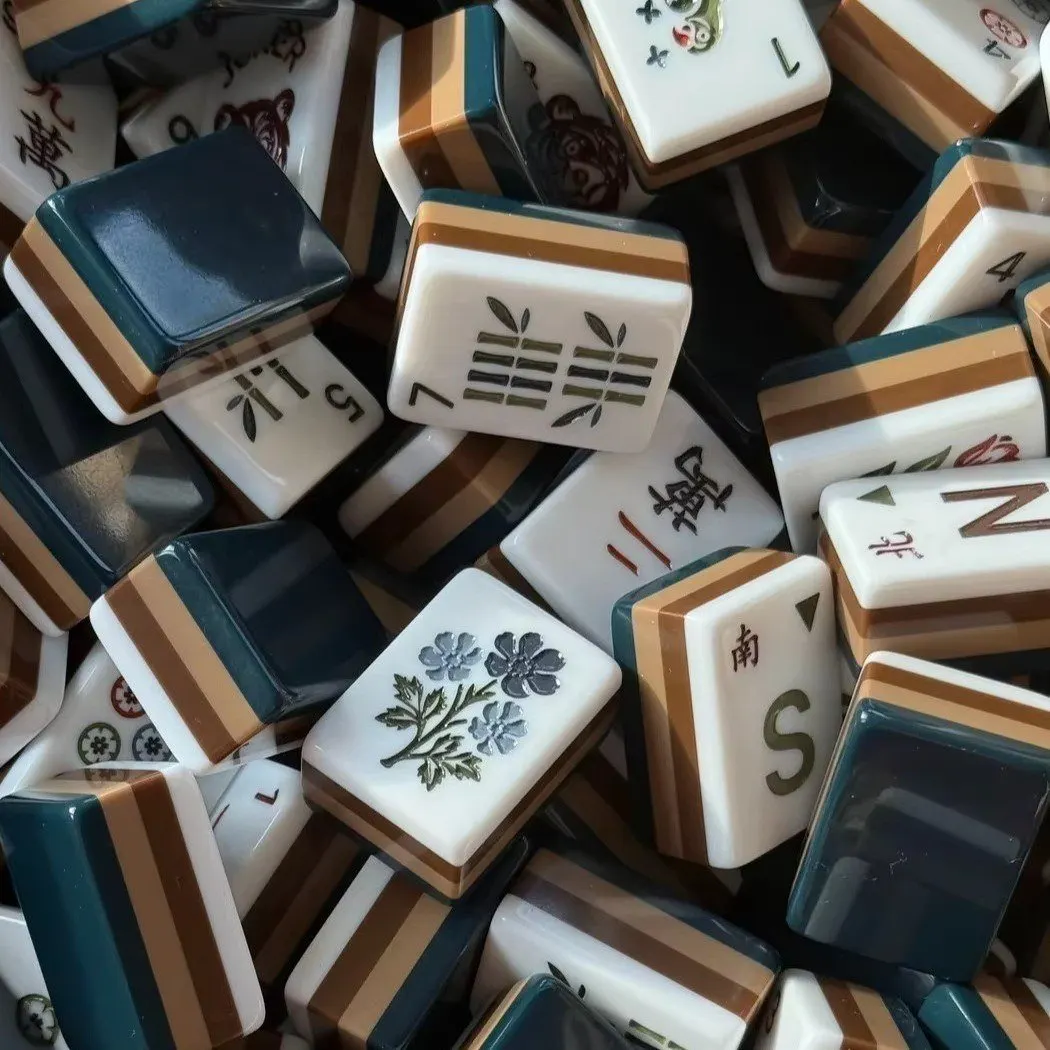 Black Bear American Mah Jongg tiles — bear faces with teal and tan four-layer sides