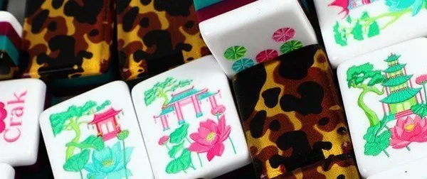 Leopard Lotus American Mah Jongg tiles — leopard-print sides with lotus and pagoda faces