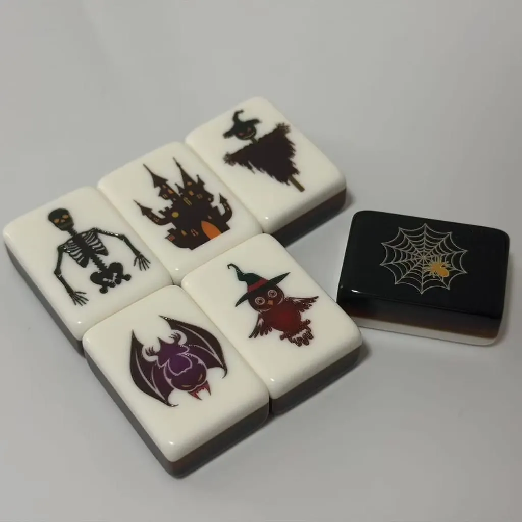 Twilight Cobweb Halloween American Mah Jongg set — pumpkin faces and gold spider-web backs
